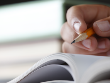 Pencil writing in book