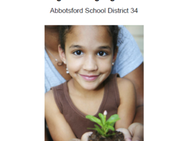 Photo of girl holding a plant
